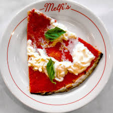 Melfi’s signature dishes Roman-style Thin Crust Pizza, Ricotta Gnudi, 50-Layer Lasagna, Martinis